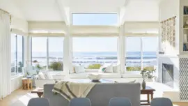 This sun-filled living room overlooking the edge of Stinson Beach.