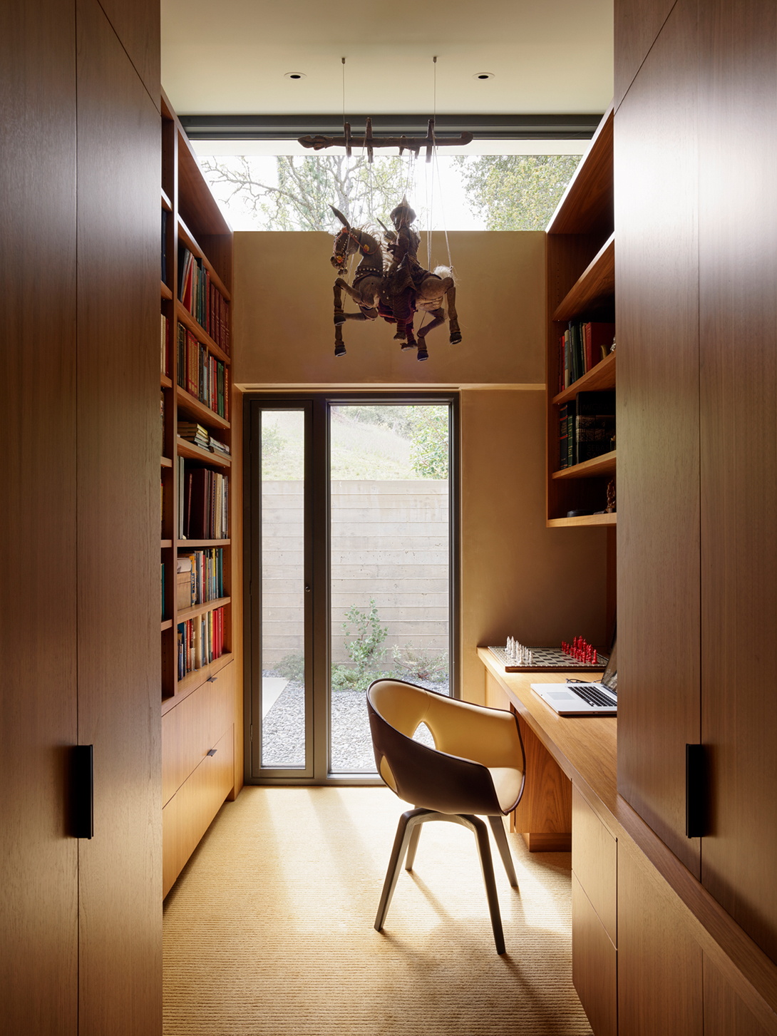 The clients, Marilyn Rosenwein and Howard Cohen, each have their own dressing room/study in the house