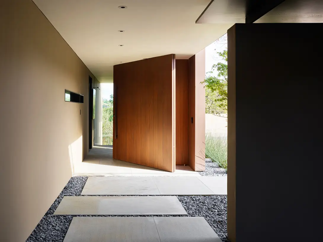 The impressive, outsize mahogany front door is a conversation-starter.