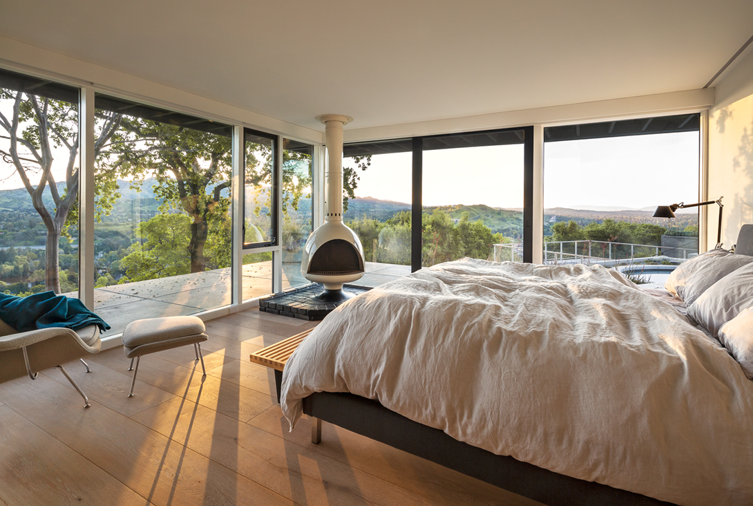 The master bedroom has its original 1950s woodstove.