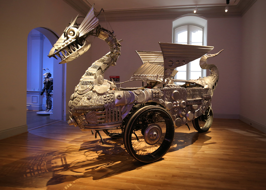 Artist Duane Flatmo’s “Tin Pan Dragon,” 2006, is composed of baking trays and other tin pans. 