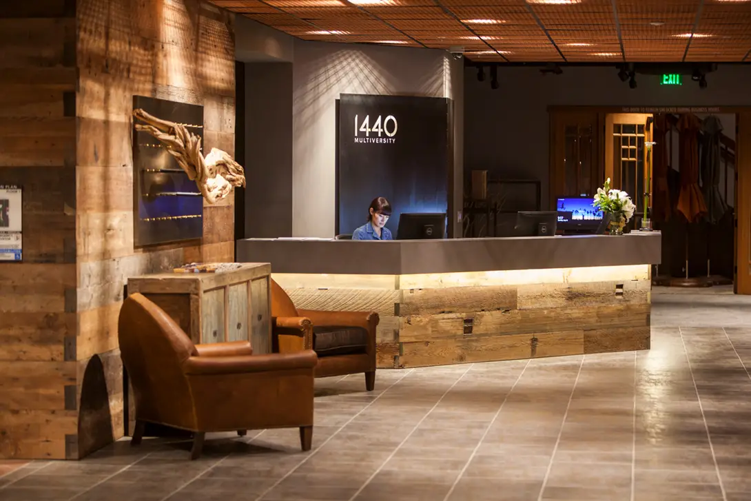 Inside the main lobby designed by Allen, walls are clad with recycled lumber.