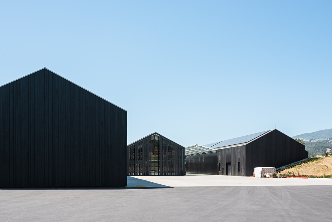 The production and barrel room building is split into several barn-like forms.