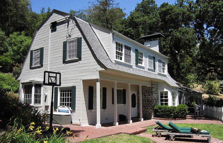 dutch colonial house with porch