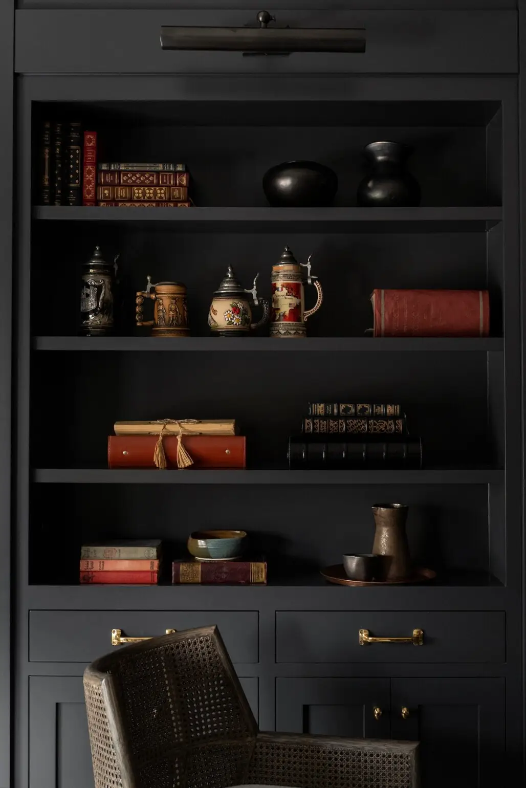 dark painted bookshelf