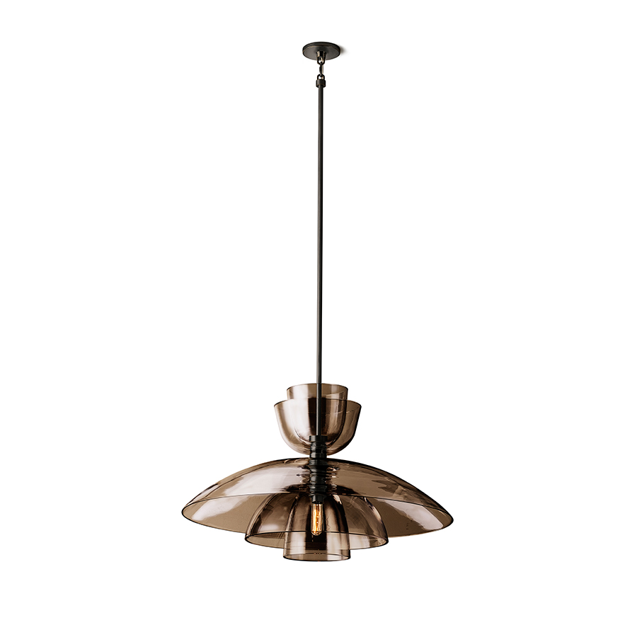 A stylish glass pendant light hanging from the ceiling, providing ambient lighting to the room.