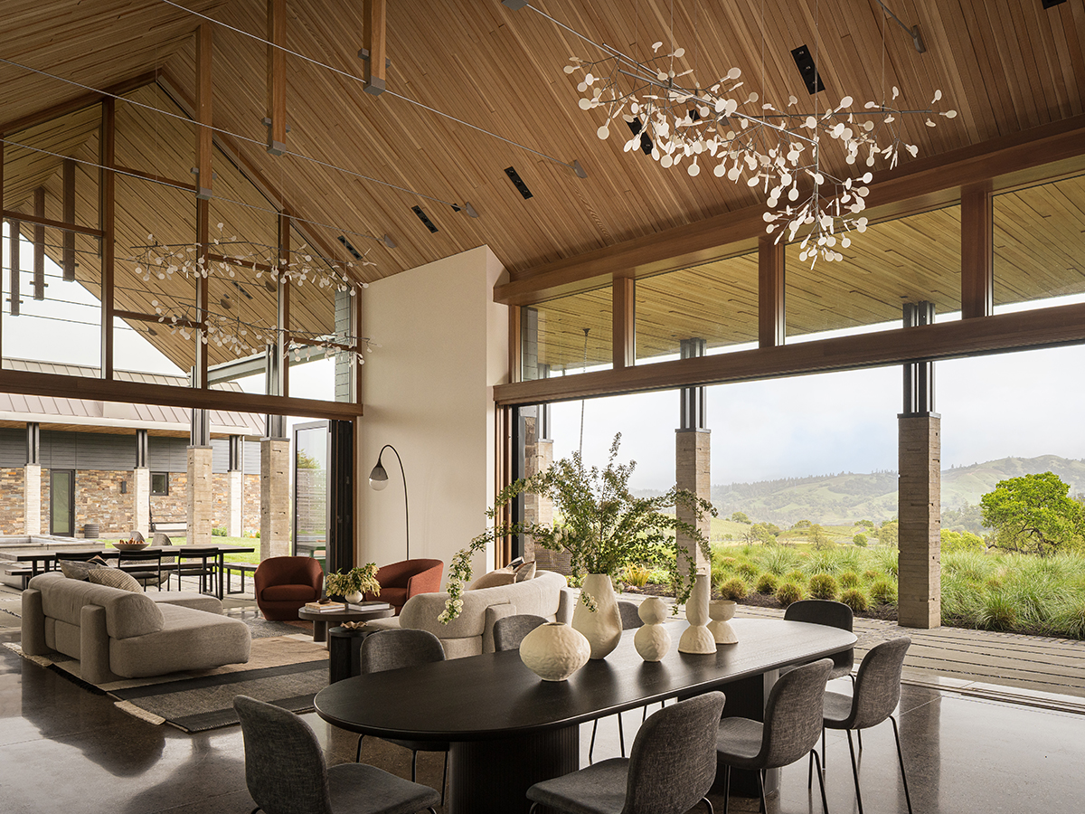 Livingroom - warm, earthy tones combine with soft textures and sinuously  shaped furnishings in the great room.