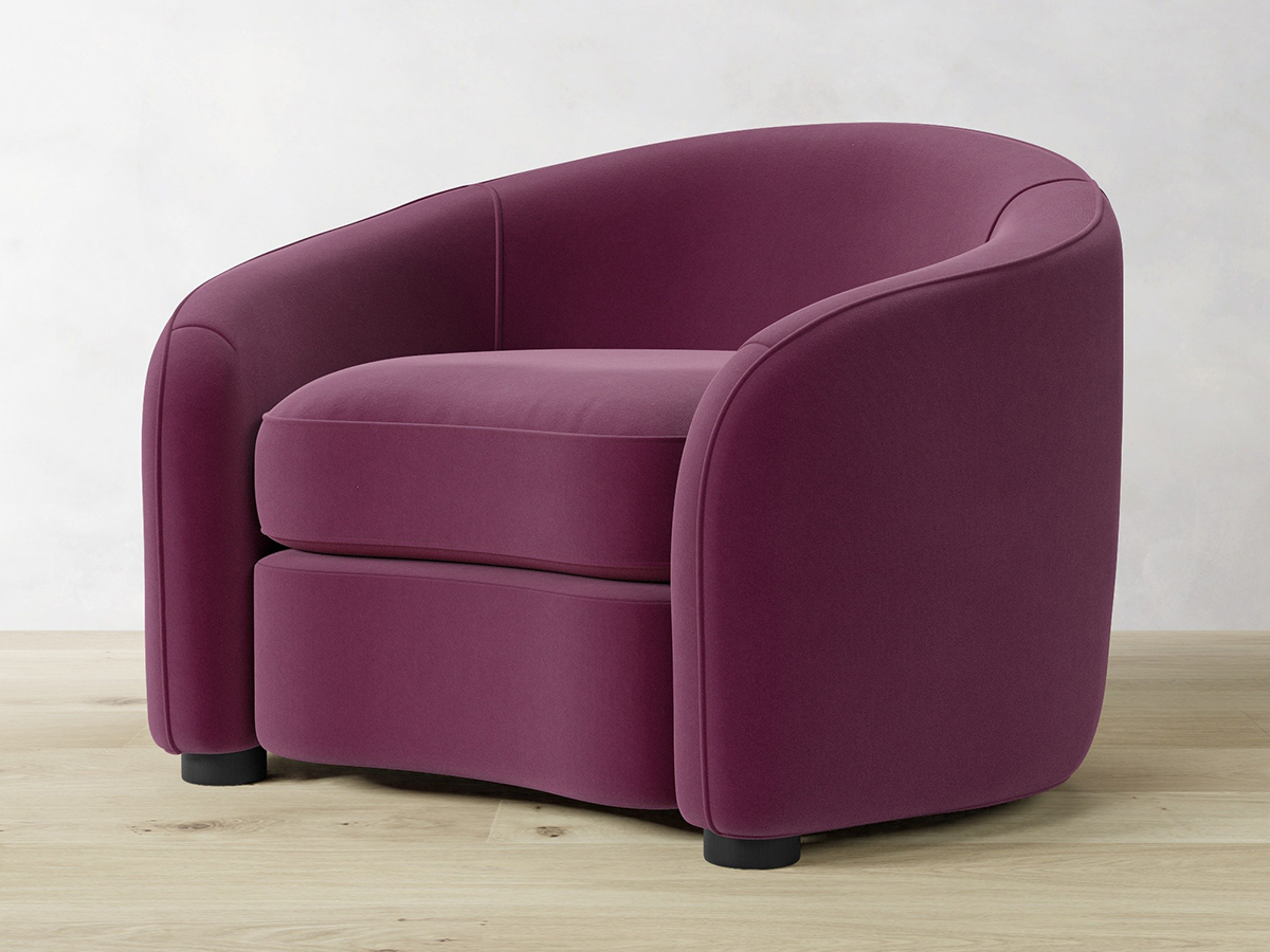A purple chair with a curved back, designed for comfort and modern aesthetics.