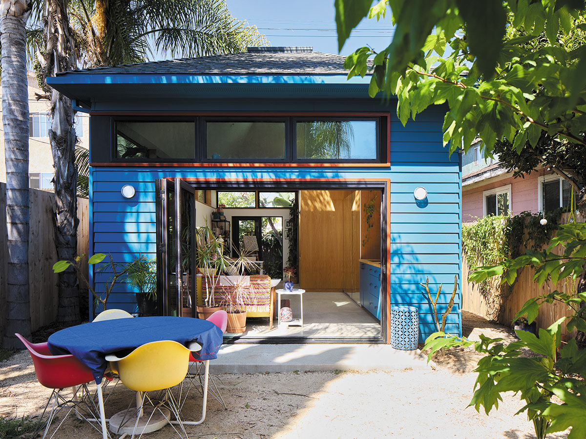 A blue house ideal for gatherings or relaxation in an ADU setting