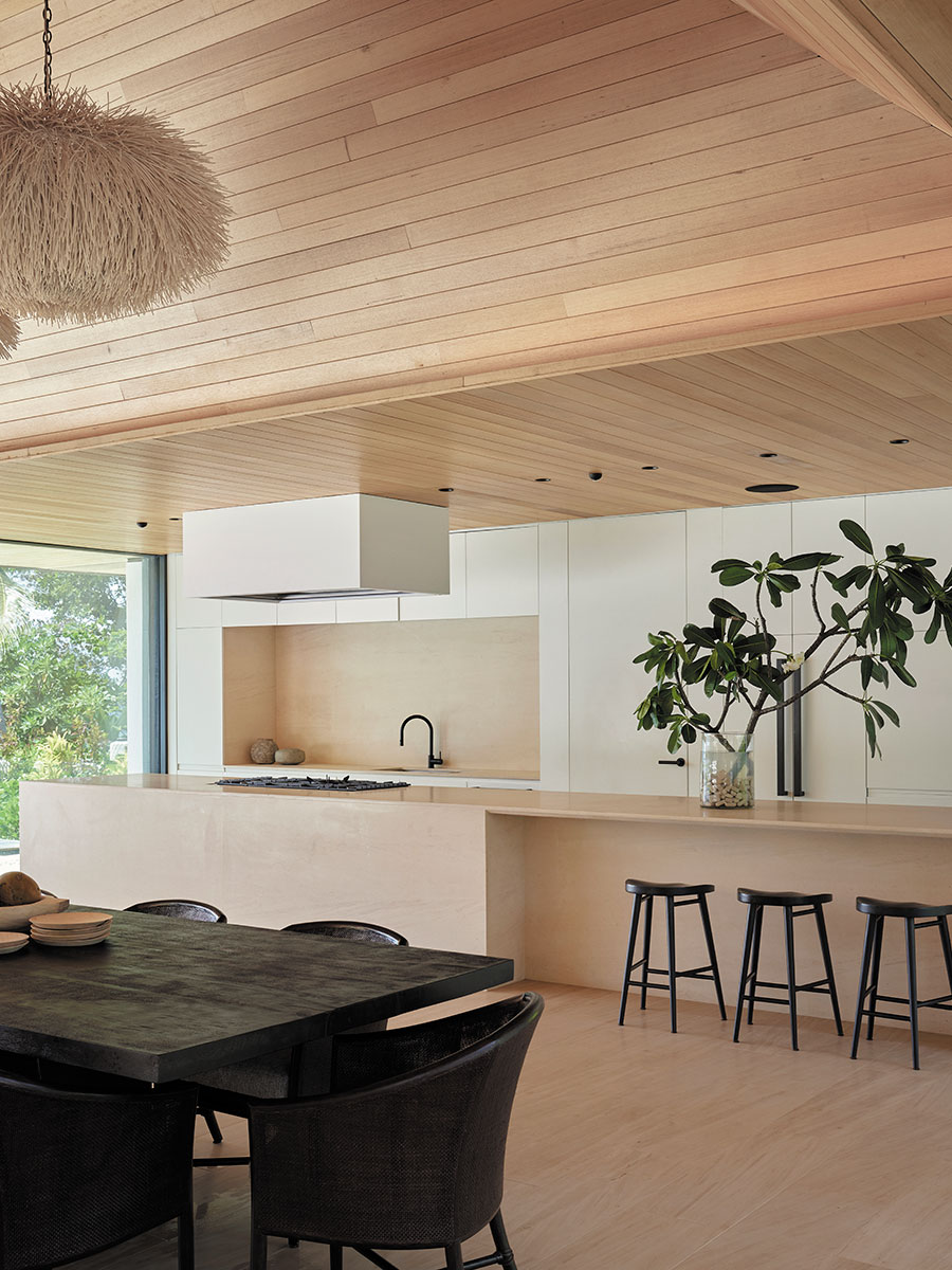 David Skelley of DJCoalition combined soft, sculptural pendant lighting and warm recessed fixtures to create a calm, ambient lighting design.