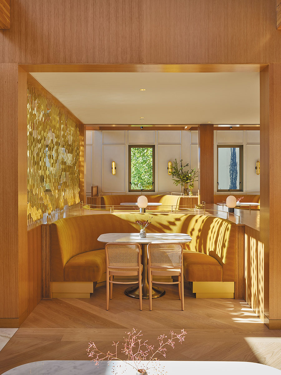 Elegant dining room featuring stylish decor and a warm ambiance for guests.