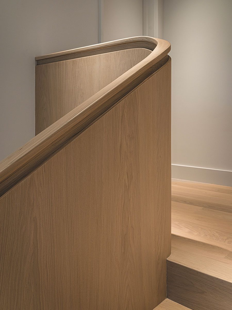 The staircase’s curves impart a sense of movement