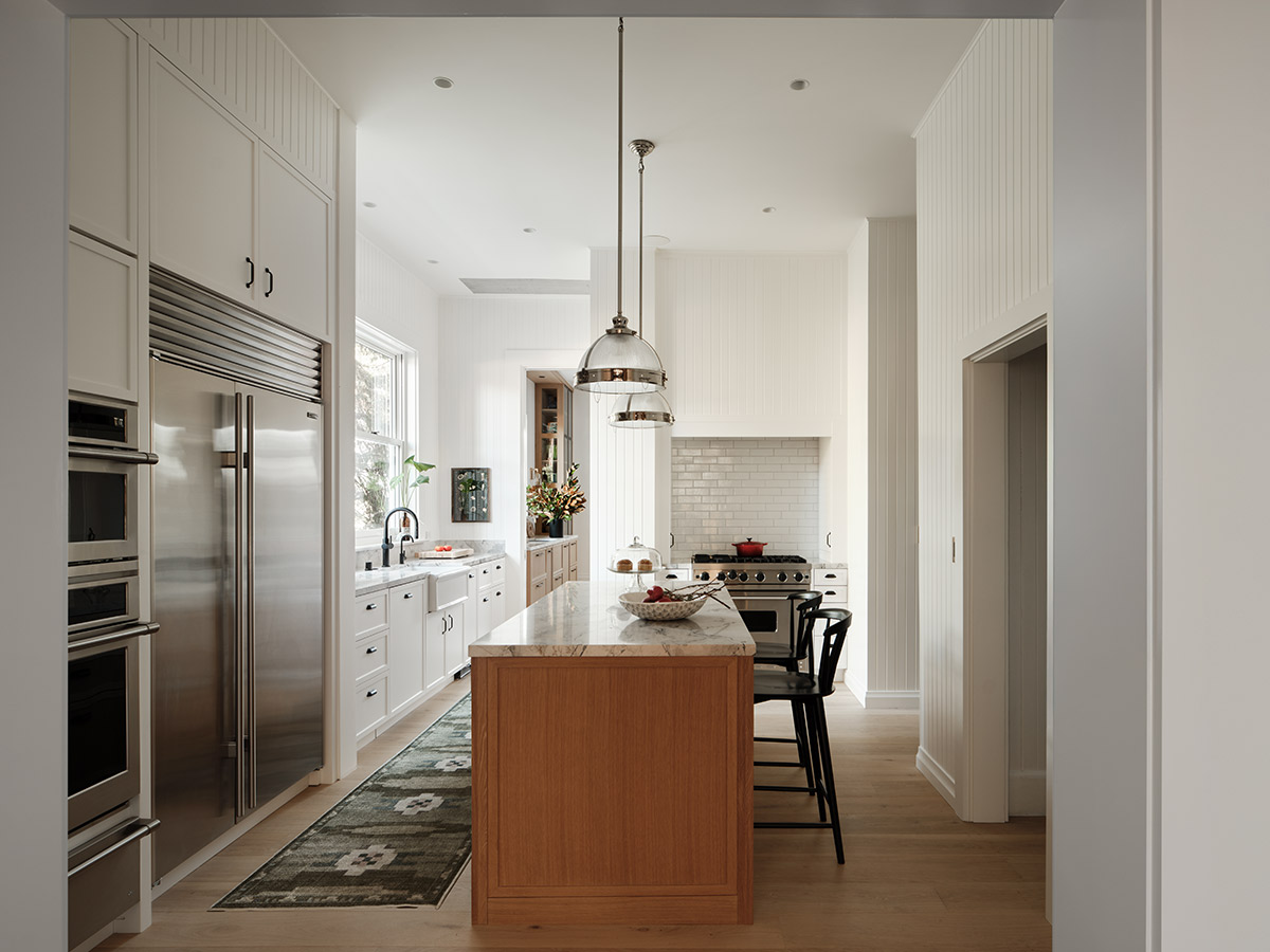 Historic Mill Valley Home, Kitchen with a wood island, pendant lights