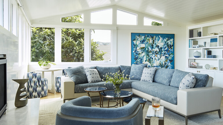 The large, abstract oil painting by John DiPaolo in the living room guided the color palette for the design.