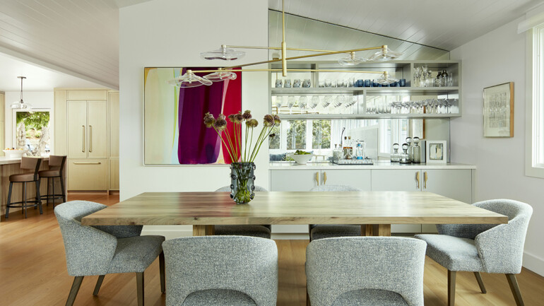 The handcrafted dining table is by Tod Von Mertens